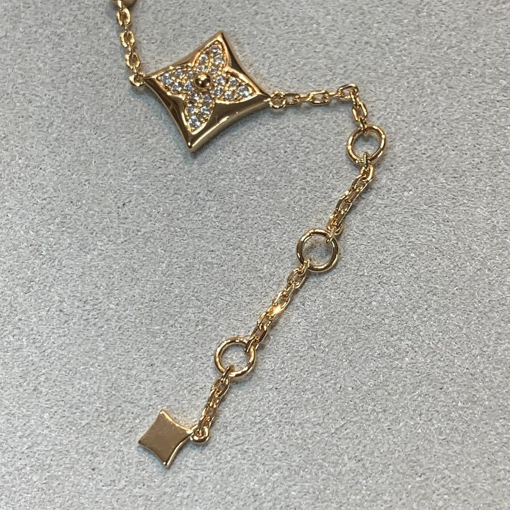 GlowSTAR AND SUN 4 MOTIFS GOLD DIAMONDS BRACELET