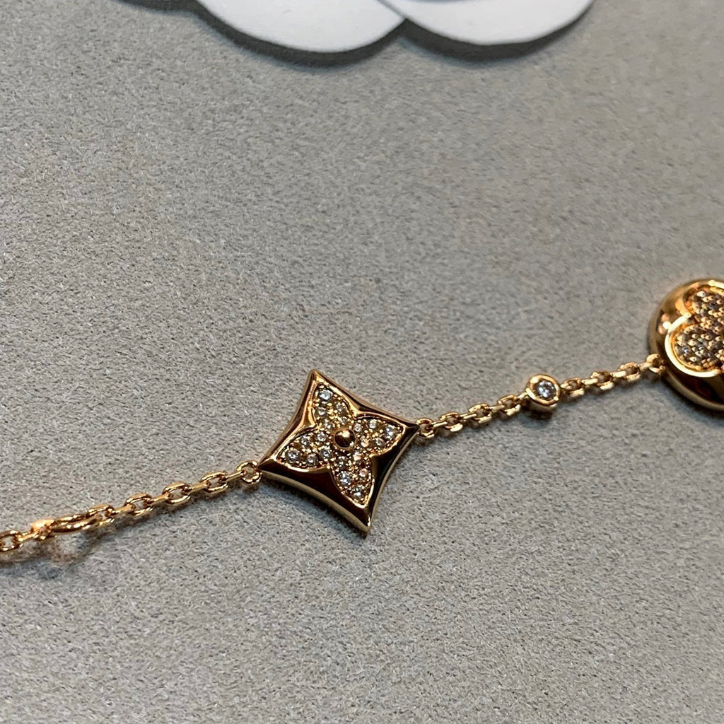 GlowSTAR AND SUN 4 MOTIFS GOLD DIAMONDS BRACELET