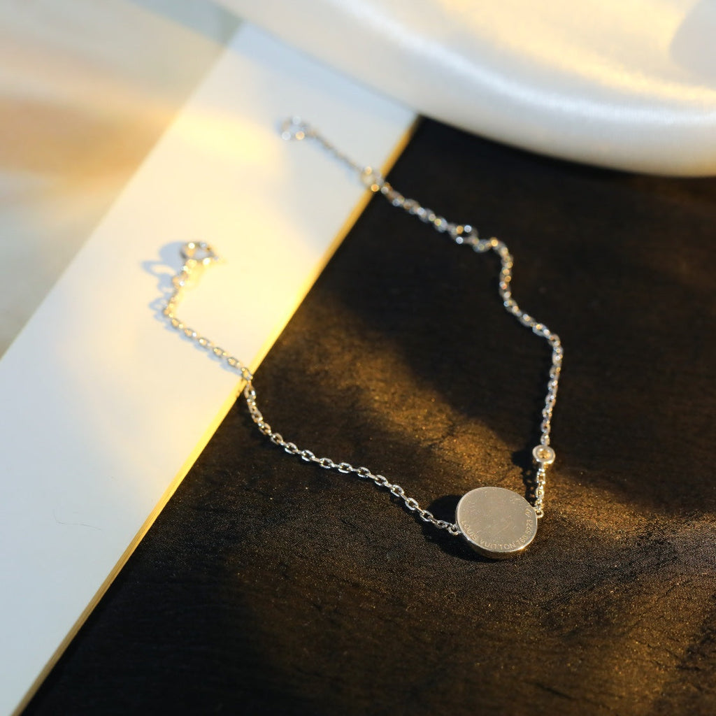 GlowSUN MOTIF PINK MOP SILVER BRACELET