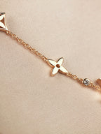 GlowSTAR AND SUN 7 MOTIFS GOLD BRACELET