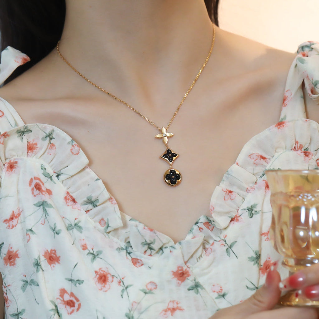 GlowSTAR AND SUN ONYX PINK GOLD NECKLACE