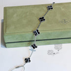 GlowCLOVER 5 MOTIF VEINED ONYX BRACELET SILVER