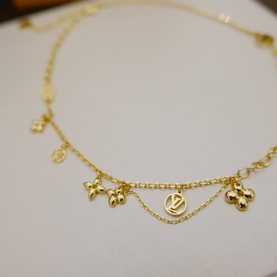 GlowBLOOMING SUPPLE NECKLACE BRASS