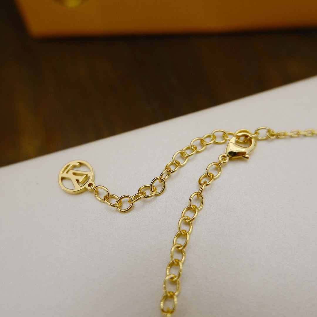 GlowBLOOMING SUPPLE NECKLACE BRASS