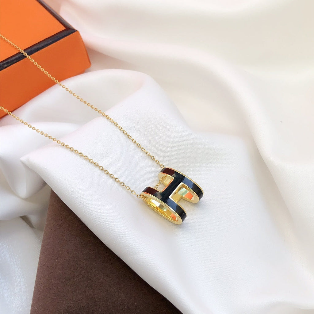 GlowHM CLIC BLACK ENAMEL GOLD NECKLACE