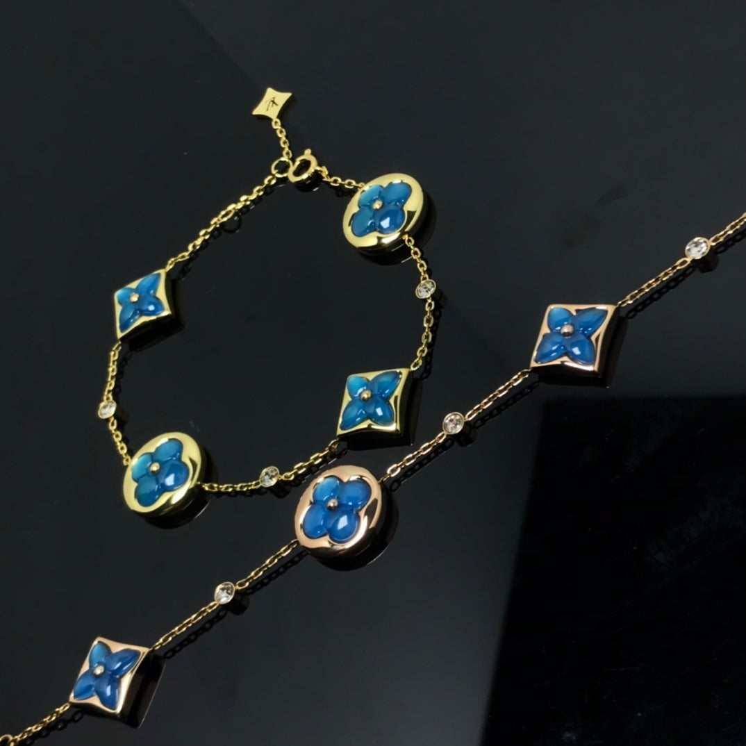 GlowSTAR AND SUN 4 MOTIF BLUE BRACELET